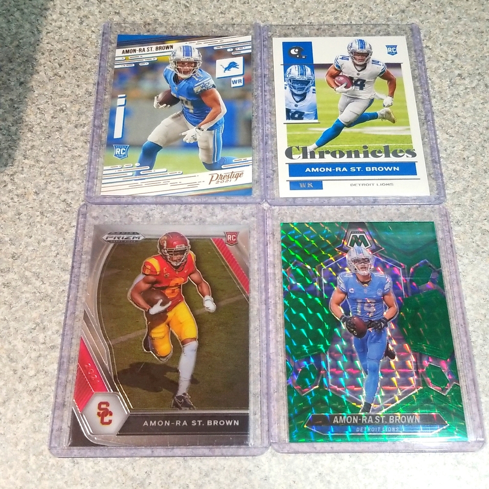 4 card Amon Ra St Brown lot.